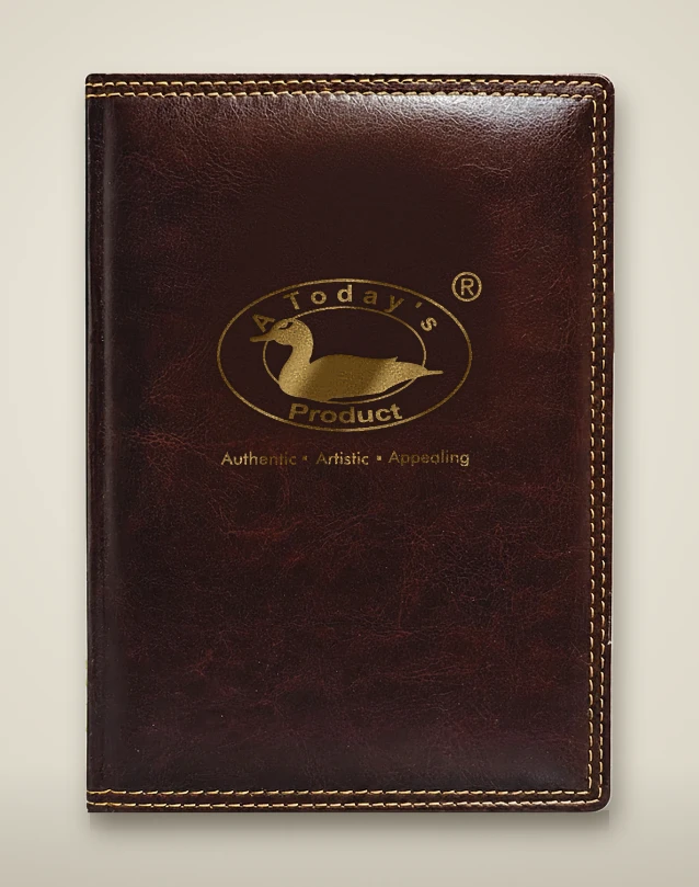 Dark brown leather diary with a gold foil logo
